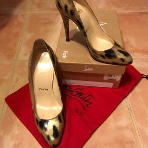 Christian Louboutin size 39 leopard print heels.